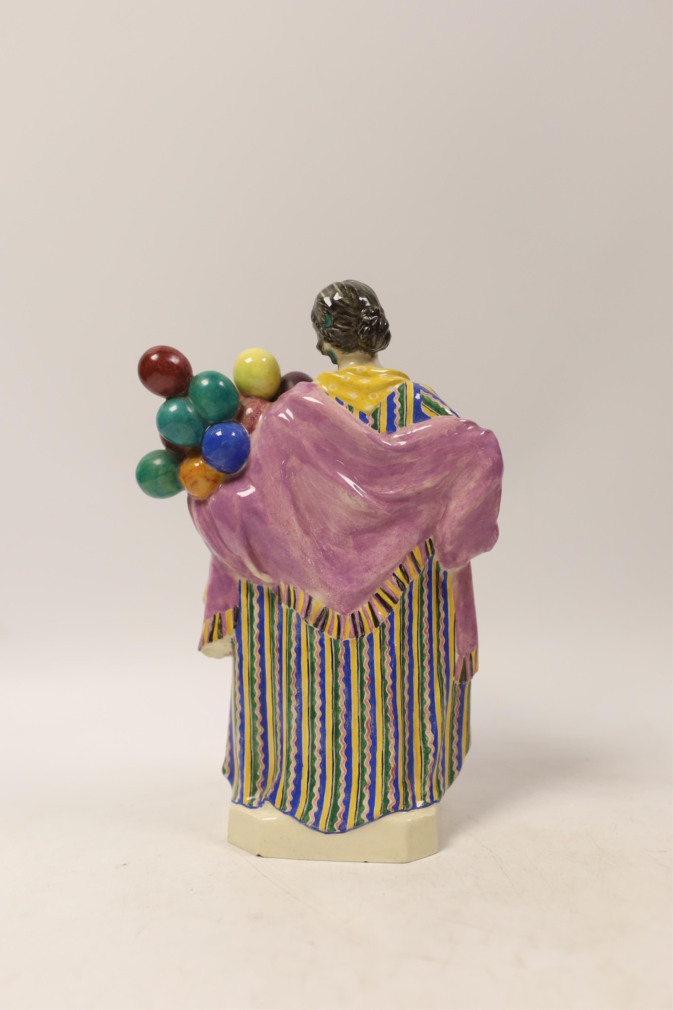 A Charles Vyse glazed model the balloon lady, dated 1921, 22cm high (a.f.)